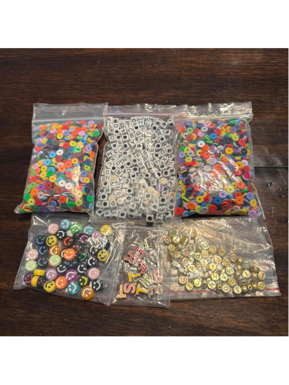 Multi-coloured beads and alphabet beads